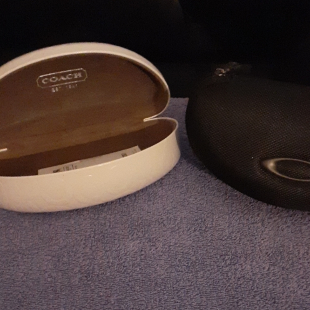 Coach and oakley sunglass cases